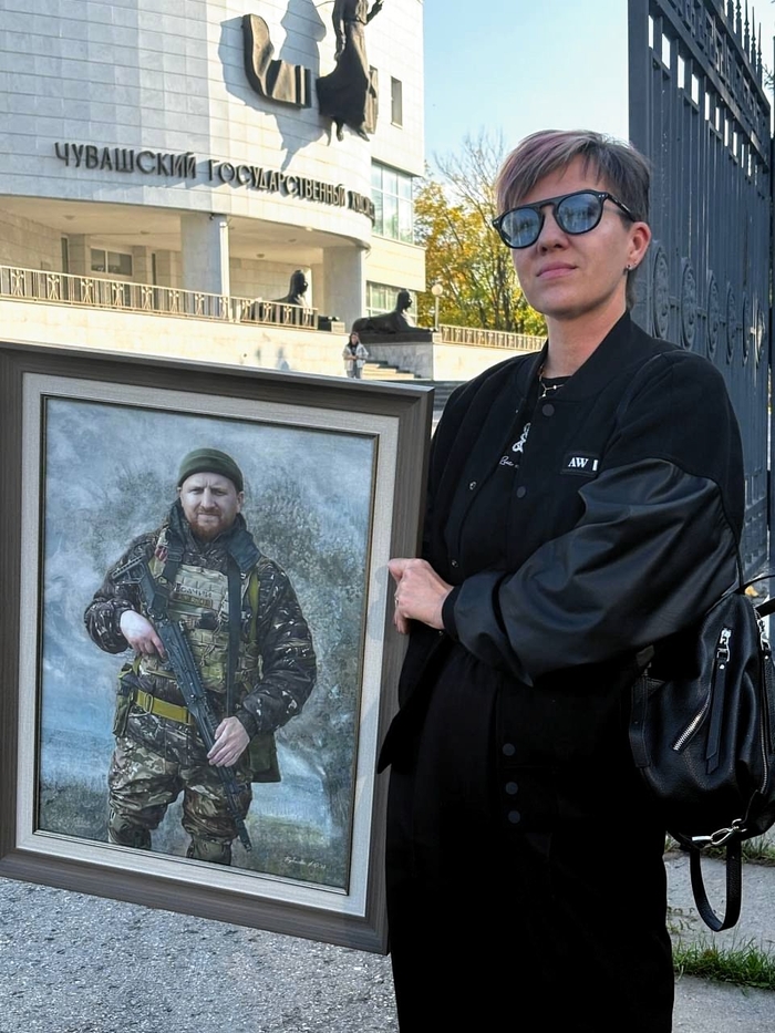 Оформленный в раму.