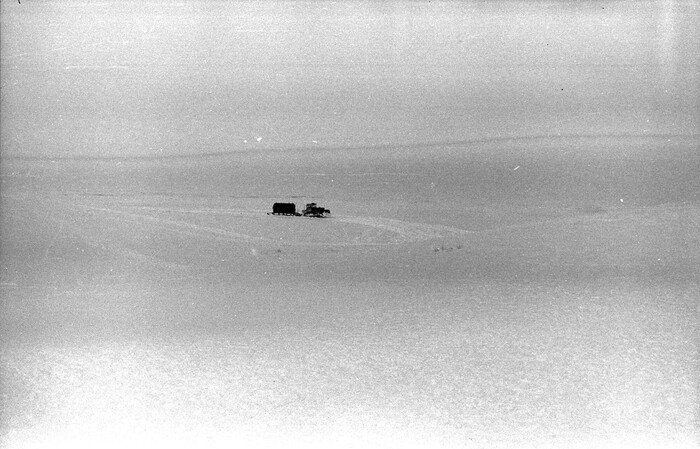 Наш трактор с балком на просторах тундры.