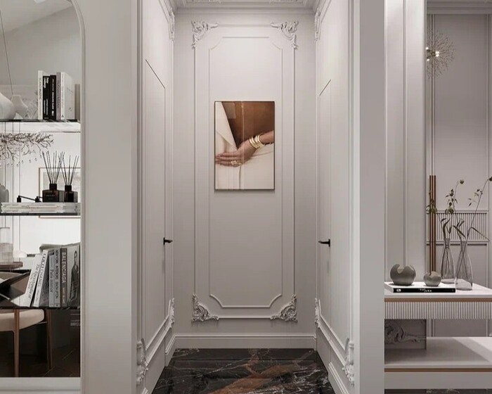 Дизайн интерьера квартиры в ЖК «Струны», прихожая с лепниной от студии Artum.