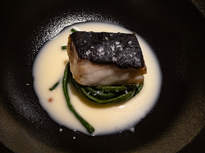 Branzino pescato all�Amo in Crosta di Olive Nere, Occhipinti e Acqua di Cioccolato Bianco all�Aceto - 2016